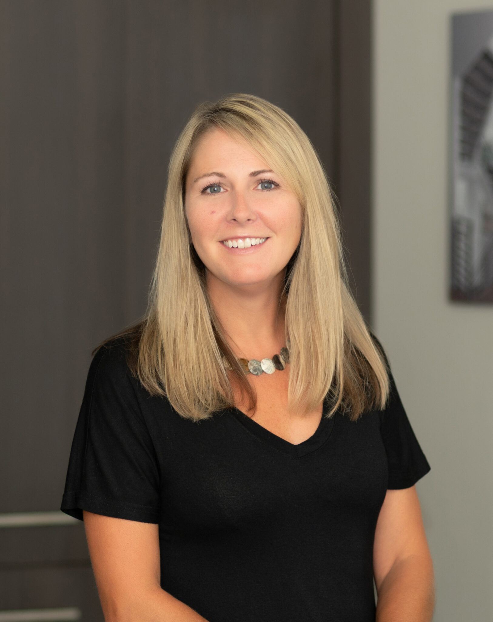 a woman smiling for the camera