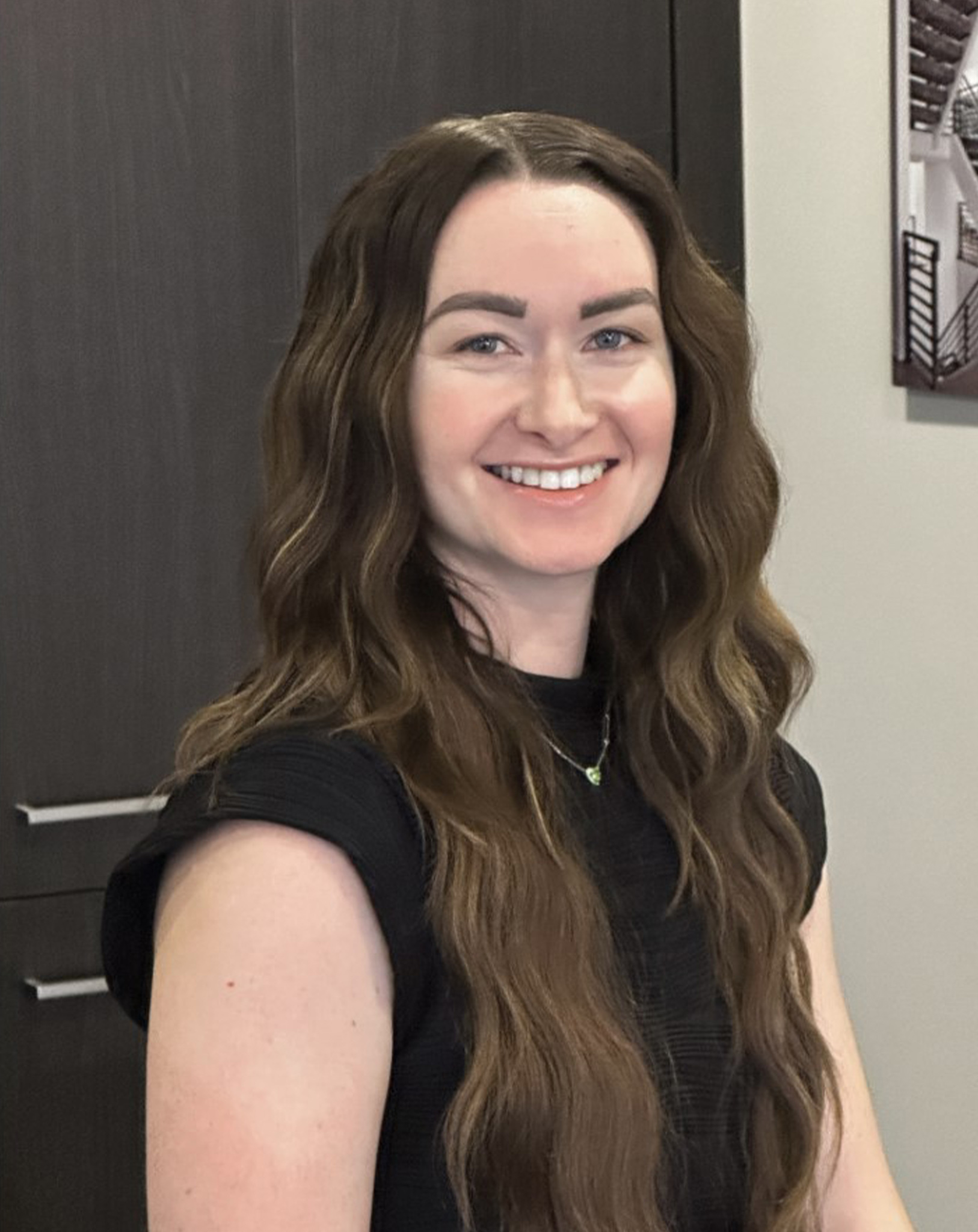 a woman smiling for the camera