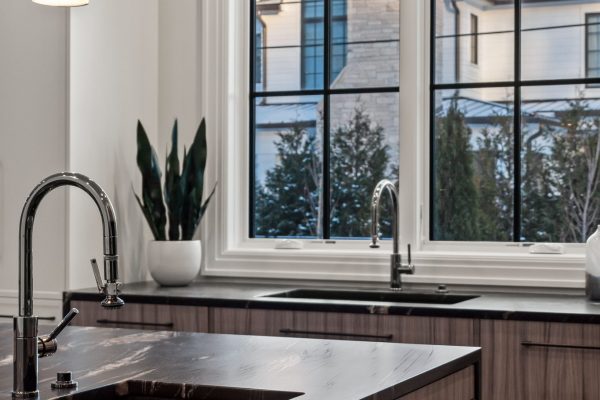a kitchen with a sink and a window