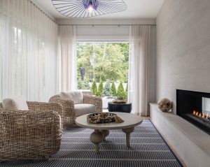 A remodeled living room with a built in fireplace added