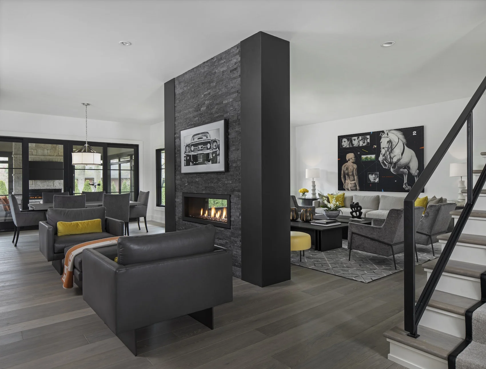 a living room filled with furniture and a tv